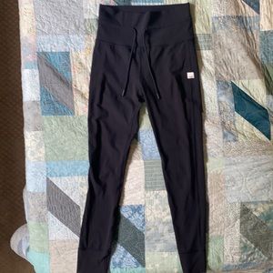 Black ankle length Vuori daily leggings from Nordstrom’s.